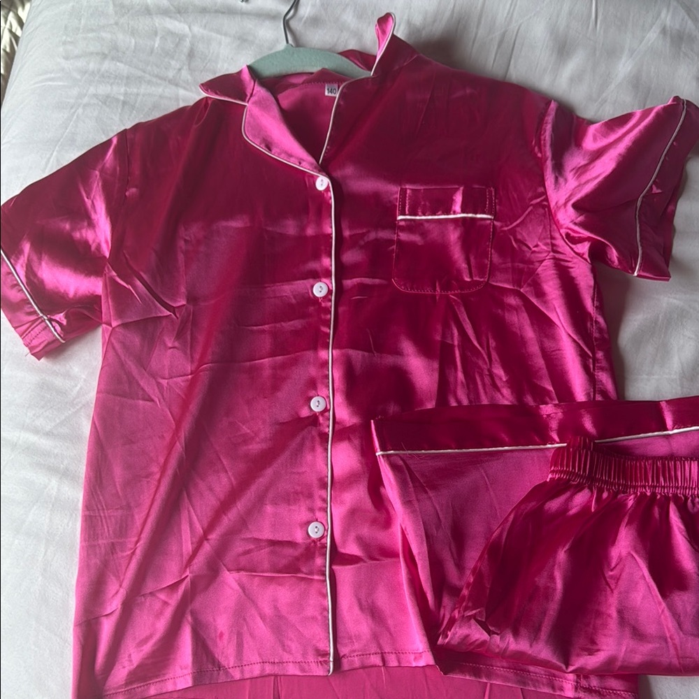 Soft and silky kids, pink pajamas, perfect for the best beauty sleep.